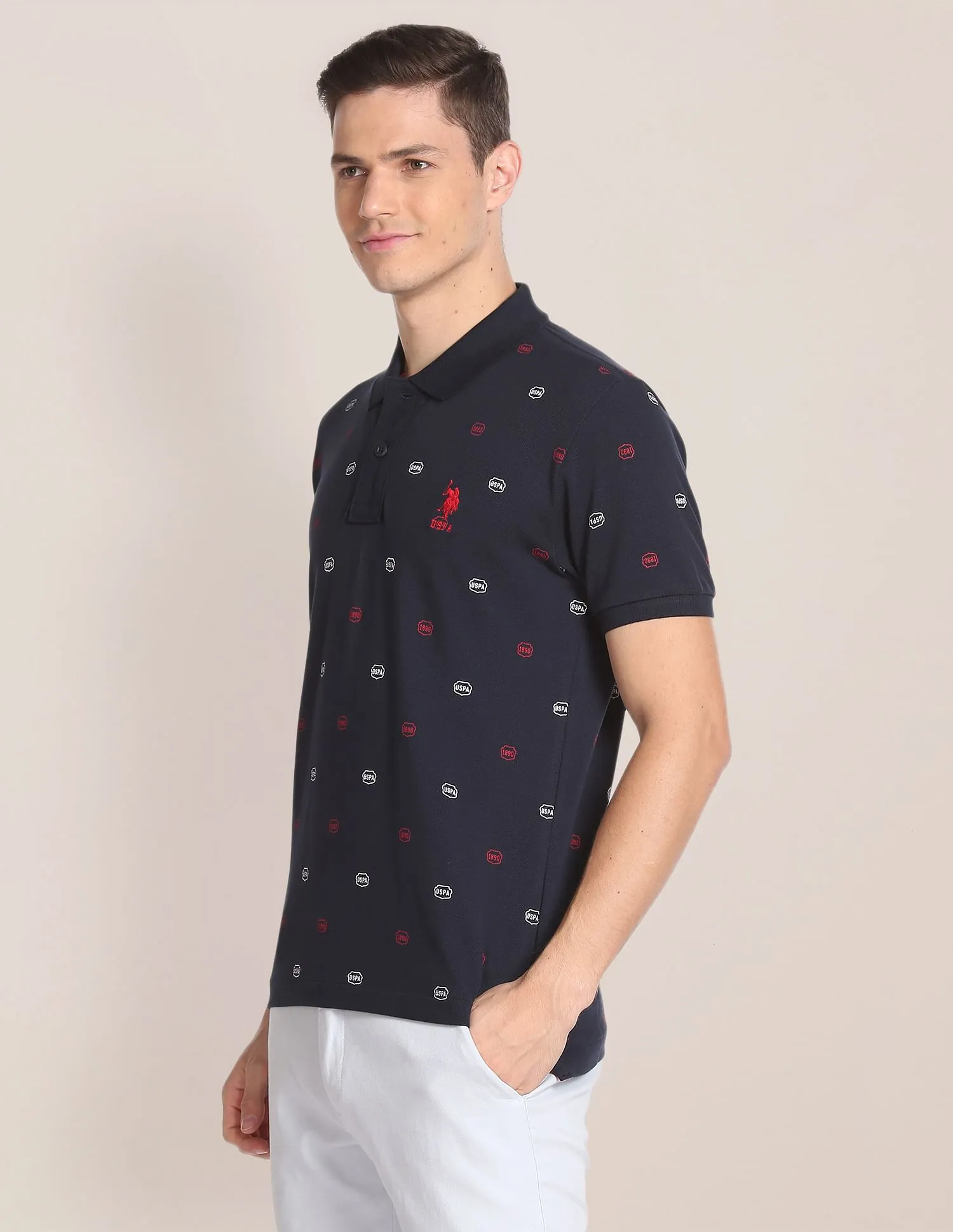 U.S. Polo Assn. All Over Brand Print Cotton Polo Shirt