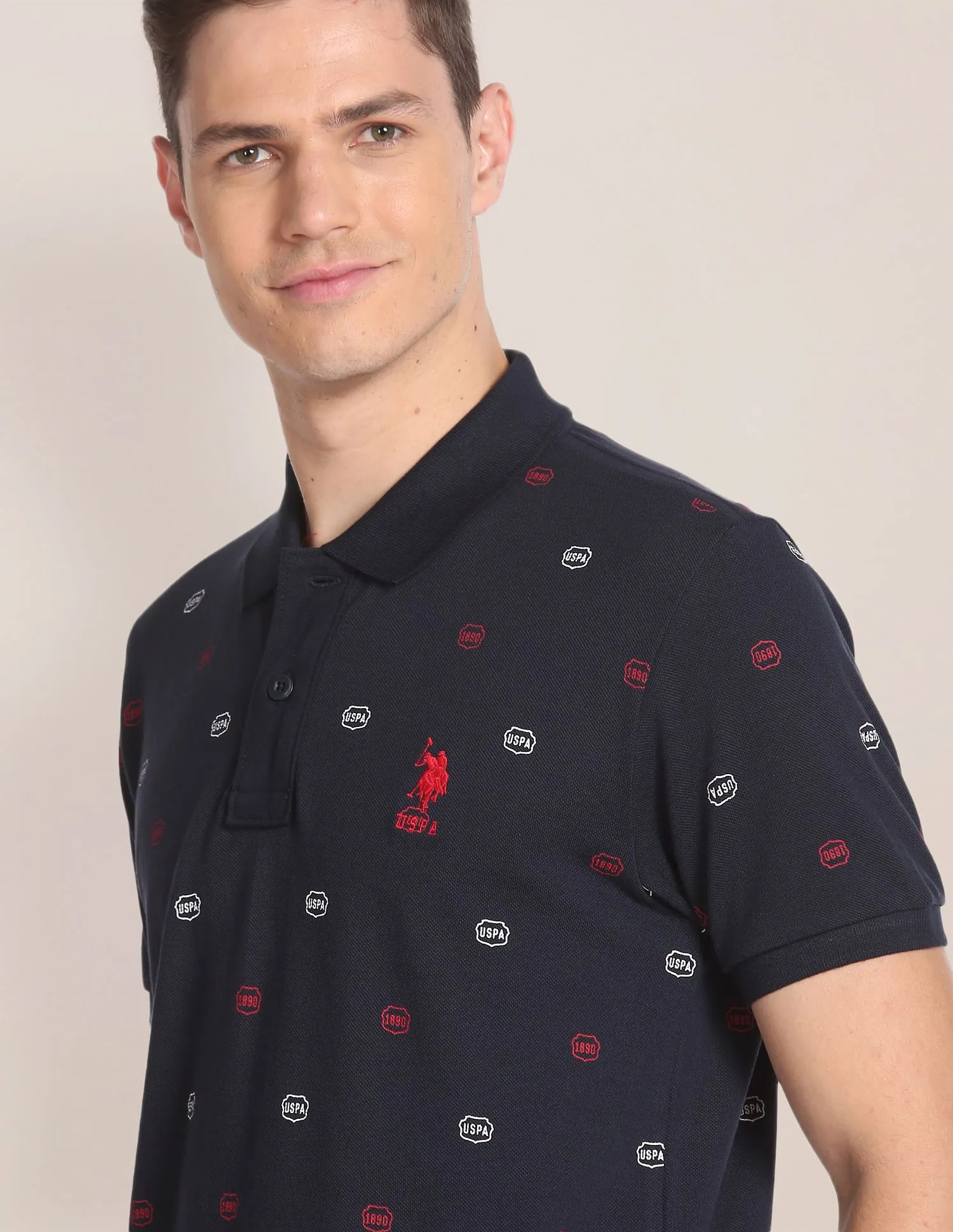 U.S. Polo Assn. All Over Brand Print Cotton Polo Shirt