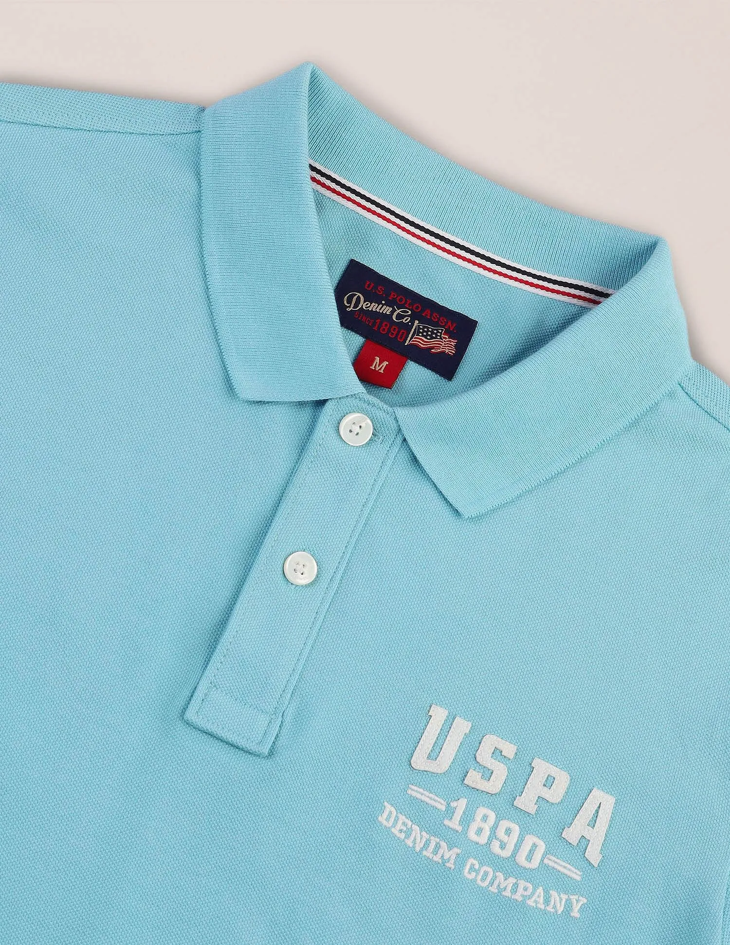 U.S. Polo Assn. Denim Co. Solid Muscle Fit Polo Shirt